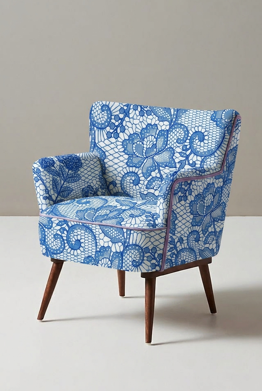 Chair with blue floral lace pattern on a plain background